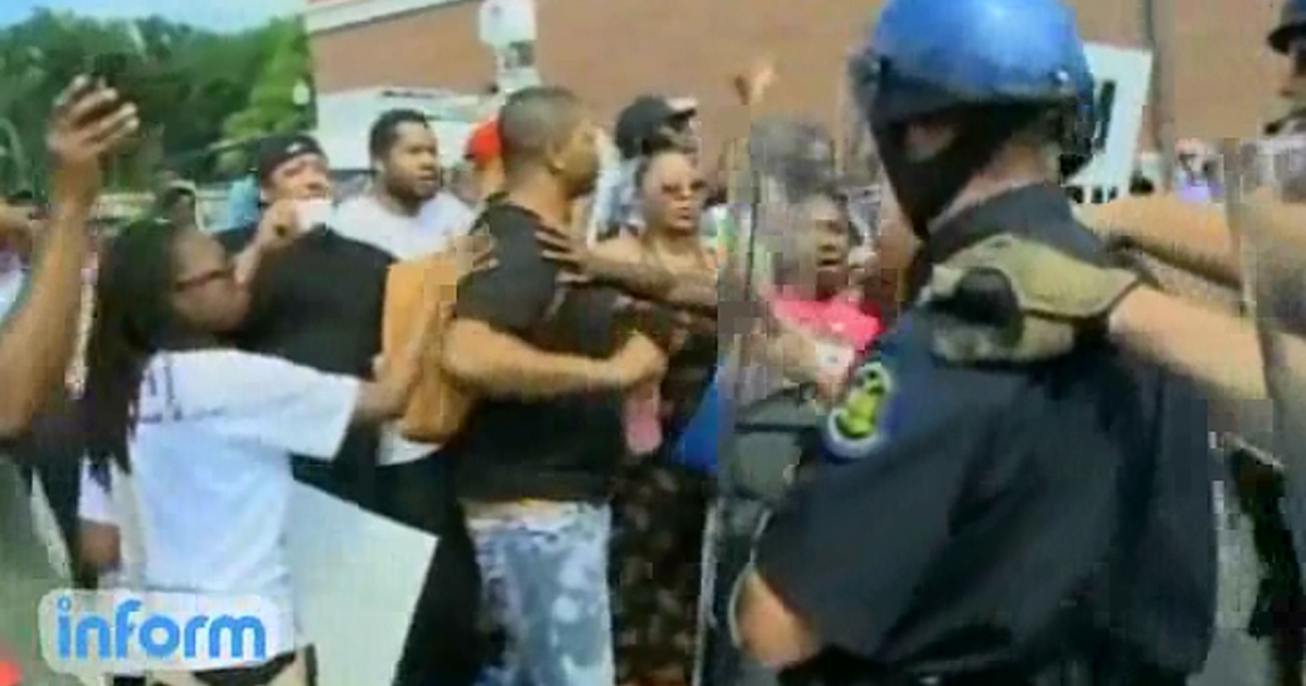 police and protesters michael brown